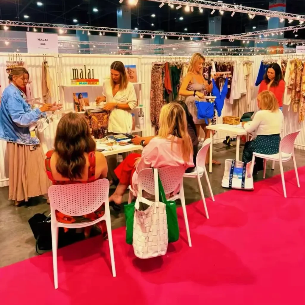 Premium multi-brand swimwear showroom setup by TS Sales Group, presenting luxury wholesale resortwear collections to North American retail buyers.