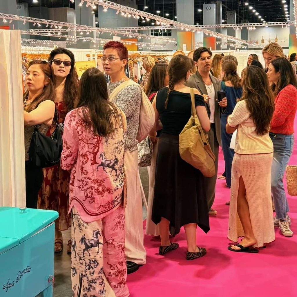 Premium multi-brand swimwear showroom setup by TS Sales Group, presenting luxury wholesale resortwear collections to North American retail buyers.