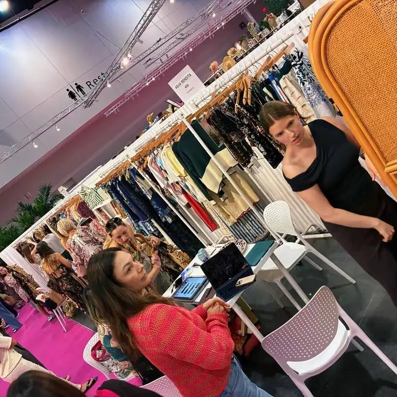 Premium multi-brand swimwear showroom setup by TS Sales Group, presenting luxury wholesale resortwear collections to North American retail buyers.