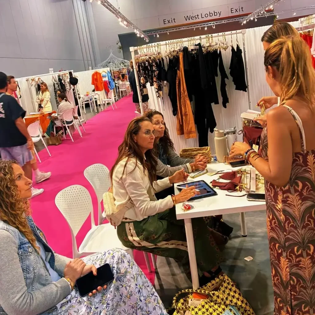 Premium multi-brand swimwear showroom setup by TS Sales Group, presenting luxury wholesale resortwear collections to North American retail buyers.